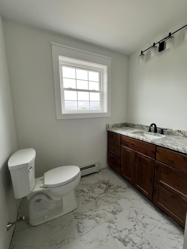 79 Pasture Ln, Brownfield, ME 04010 - half bathroom with a baseboard heating unit, marble look tiles, and vanity