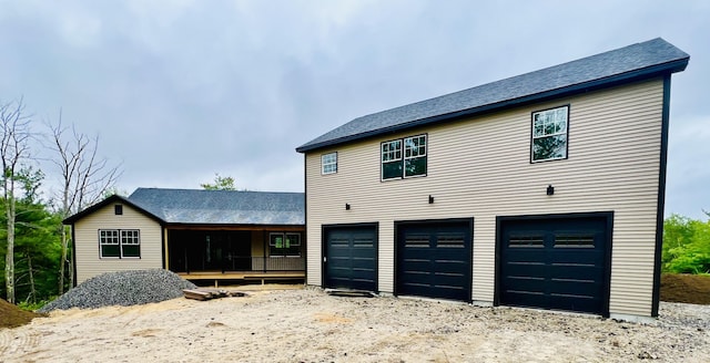 79 Pasture Ln, Brownfield, ME 04010 - view of front facade with an attached garage and driveway