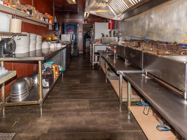 kitchen with dark hardwood / wood-style floors and vaulted ceiling