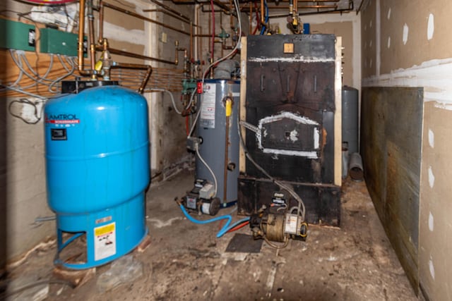 utility room with water heater