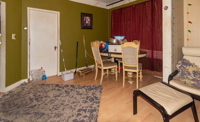 dining room with wood-type flooring