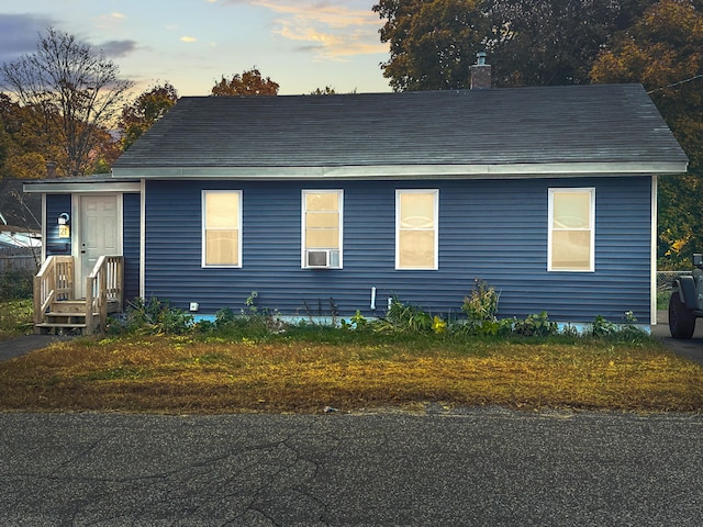 view of front facade featuring cooling unit