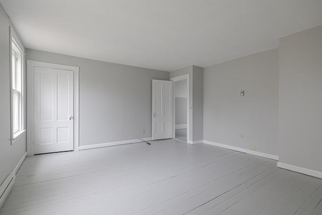 empty room featuring light hardwood / wood-style floors