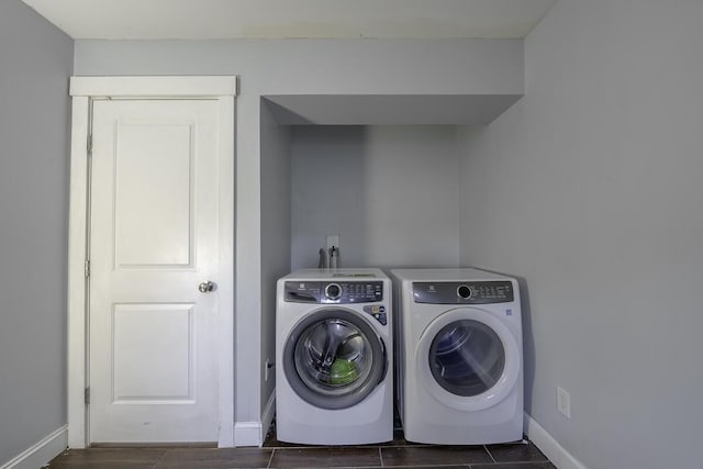 clothes washing area featuring washing machine and dryer