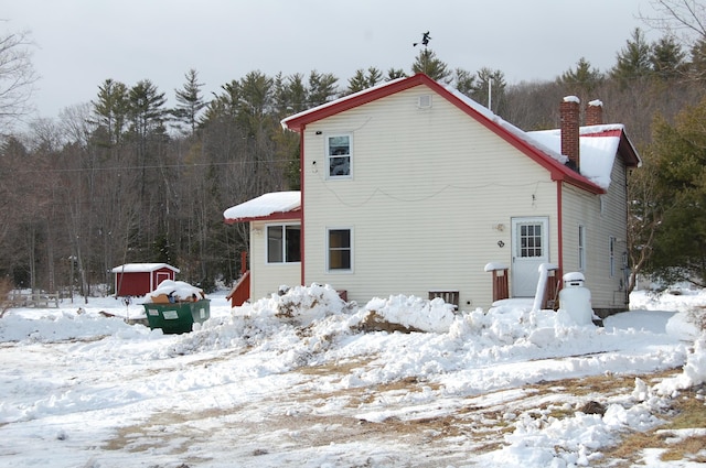 view of snow covered property