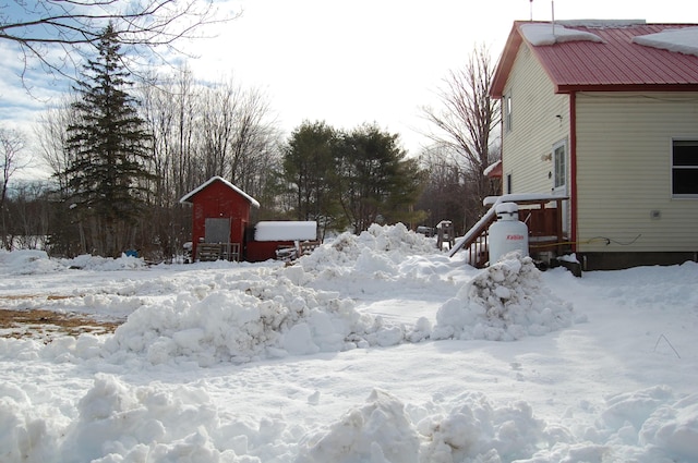 view of yard covered in snow