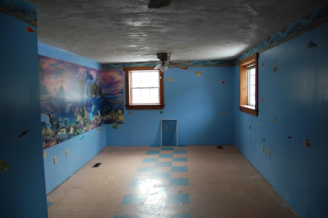 spare room featuring ceiling fan