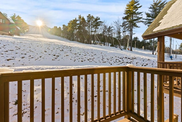 view of snow covered deck