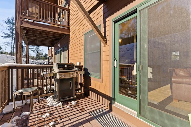 wooden deck with area for grilling