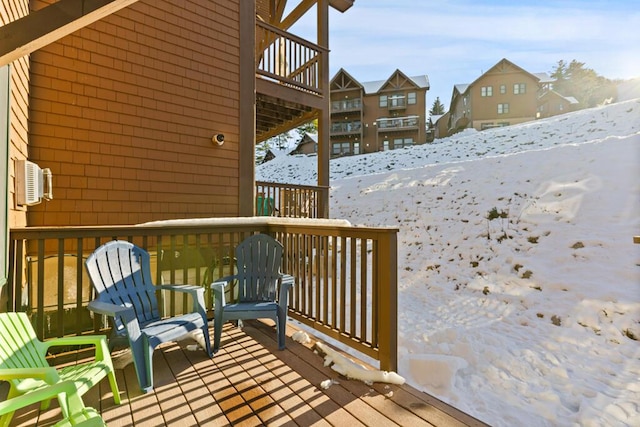 view of snow covered deck