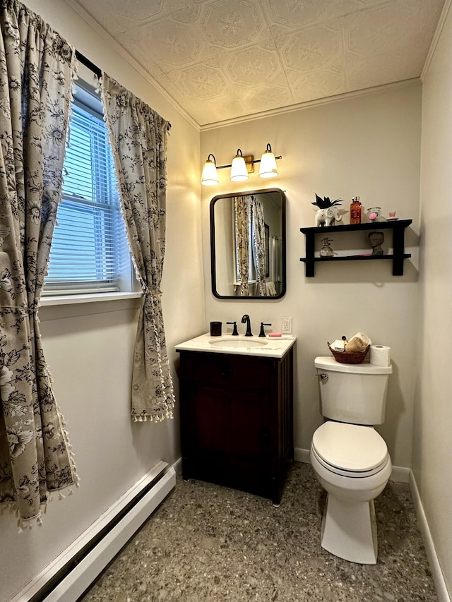 bathroom with vanity, a baseboard radiator, ornamental molding, and toilet