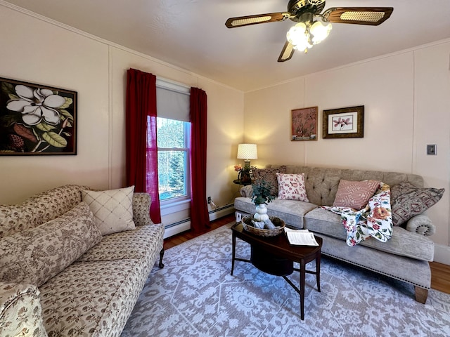 living room featuring hardwood / wood-style flooring, ceiling fan, and baseboard heating