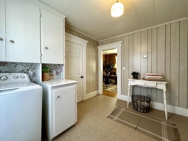 laundry area with cabinets and washer / clothes dryer