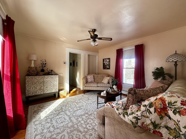 living room with hardwood / wood-style flooring and ceiling fan