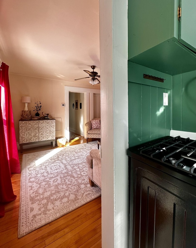 interior space featuring hardwood / wood-style flooring and ceiling fan