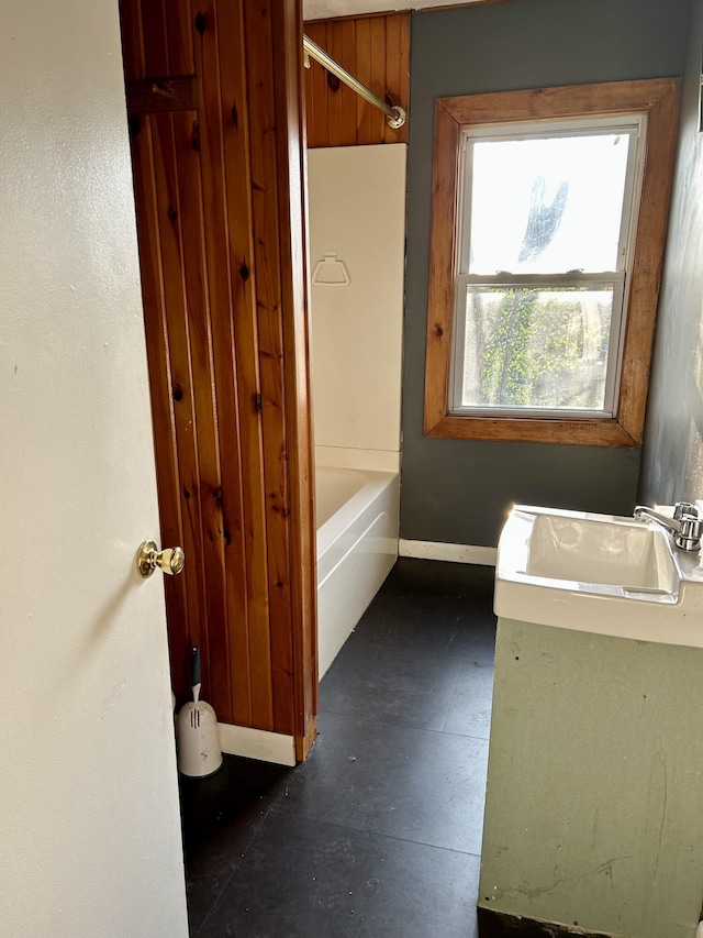 bathroom with shower / tub combination