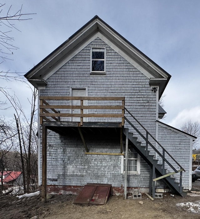 rear view of house with stairs