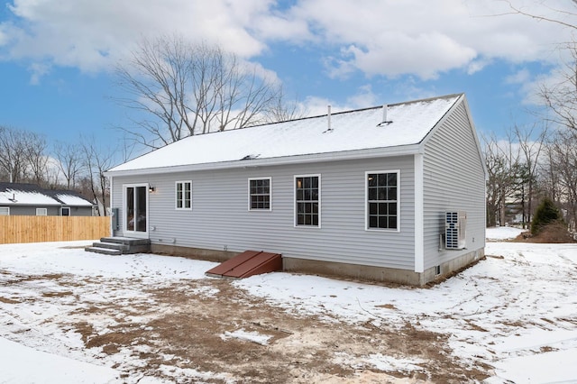 view of snow covered house