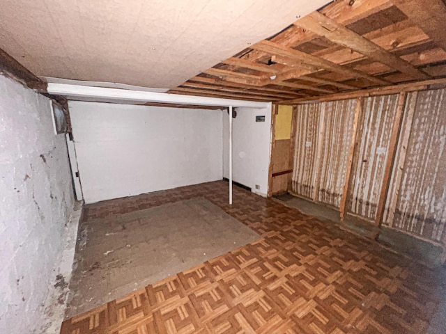 basement with parquet flooring