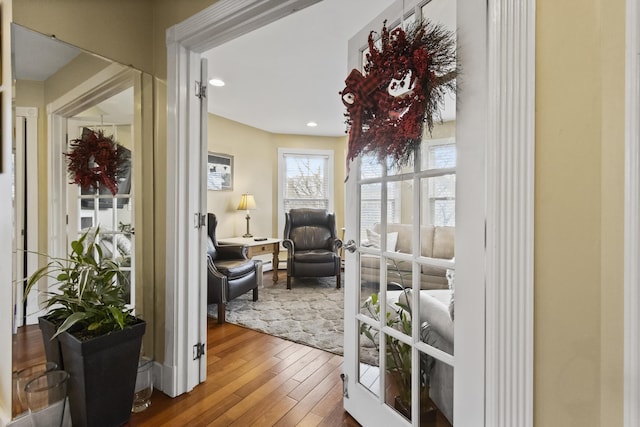 doorway to outside featuring hardwood / wood-style floors and french doors