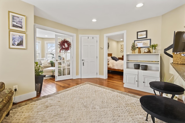 sitting room with hardwood / wood-style floors