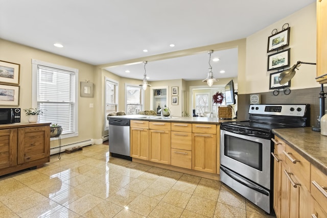 kitchen with light brown cabinets, a baseboard heating unit, pendant lighting, decorative backsplash, and appliances with stainless steel finishes