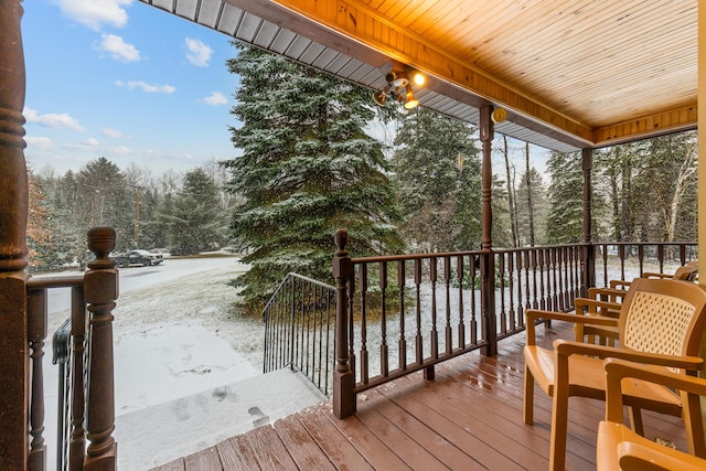 view of snow covered deck