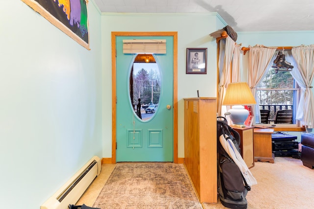 foyer featuring crown molding, carpet floors, and a baseboard heating unit