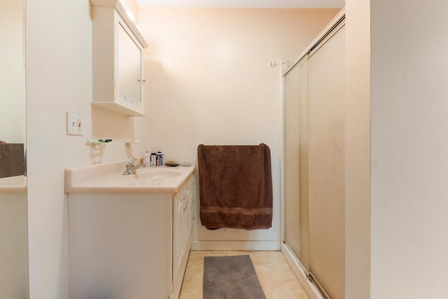 bathroom featuring vanity and walk in shower