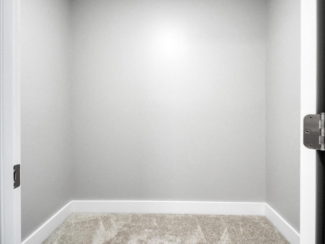 unfurnished room featuring carpet flooring