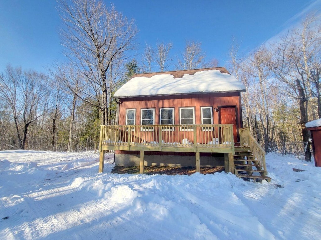 406 Kimball Pond Rd, Vienna, ME 04360 - view of front of house with a wooden deck