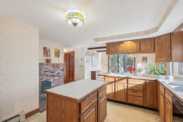 kitchen with dishwasher, a center island, and baseboard heating