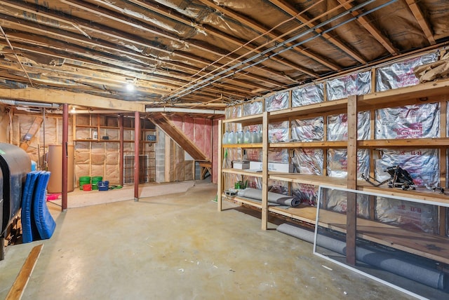 basement featuring water heater