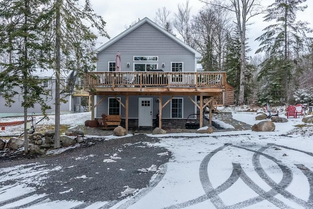 view of front of house featuring a wooden deck