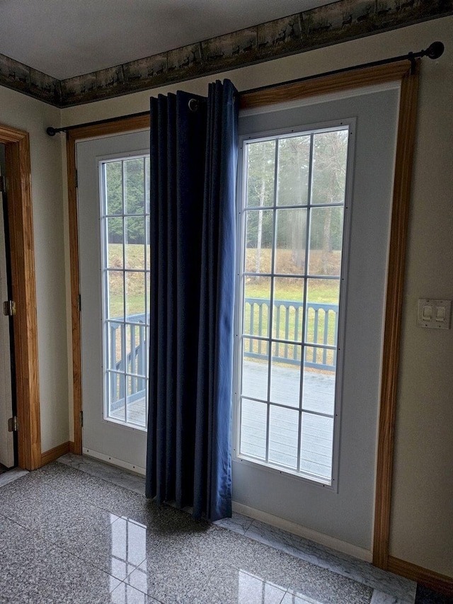 doorway with baseboards