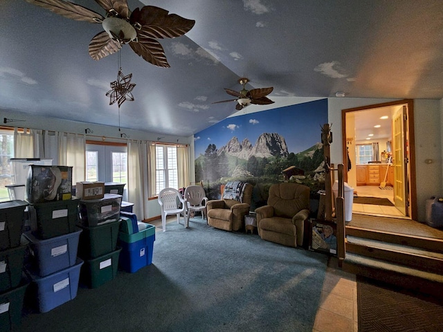 living room with vaulted ceiling and ceiling fan
