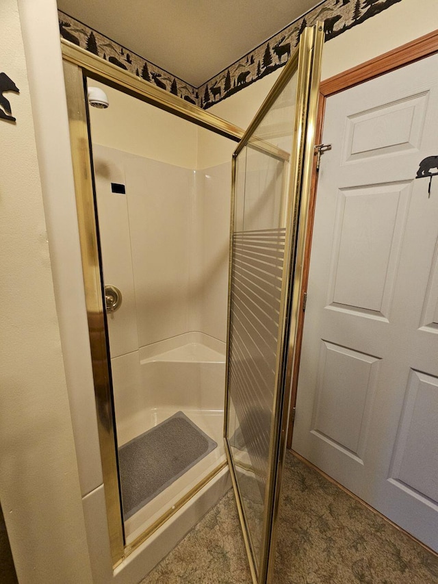 bathroom featuring a stall shower