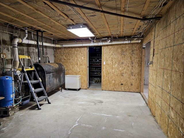 unfinished below grade area featuring heating fuel