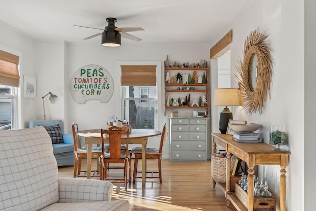 dining room featuring light wood-style flooring and ceiling fan