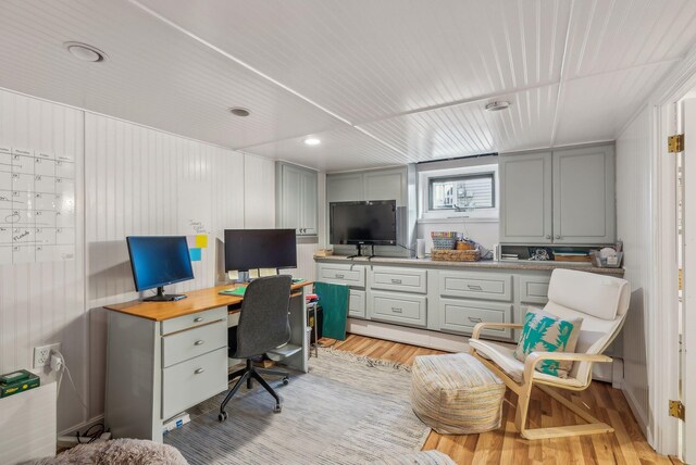 office space featuring light wood-style floors