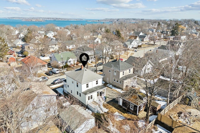 birds eye view of property with a residential view