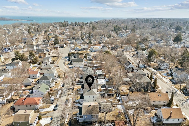 birds eye view of property featuring a residential view and a water view