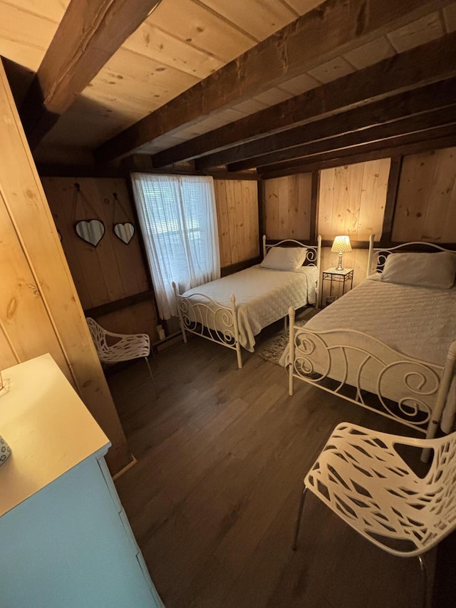 70 Hall Quarry Rd, Mount Desert, ME 04660 - bedroom with wood walls and dark wood-style flooring