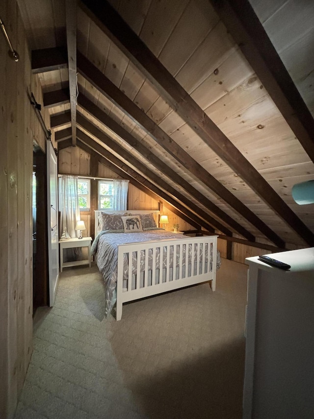 70 Hall Quarry Rd, Mount Desert, ME 04660 - bedroom with wood walls, wooden ceiling, and carpet flooring