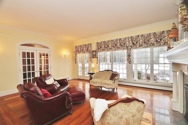 living room with baseboard heating, french doors, wood-type flooring, and ornamental molding