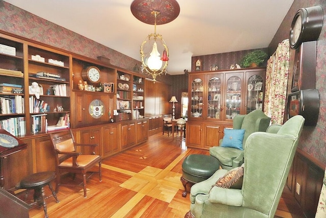 sitting room featuring light hardwood / wood-style floors