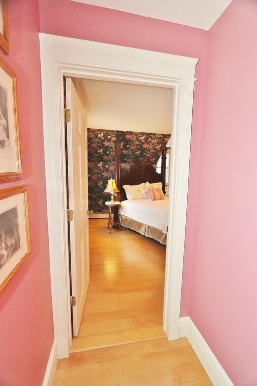 hallway with light hardwood / wood-style flooring