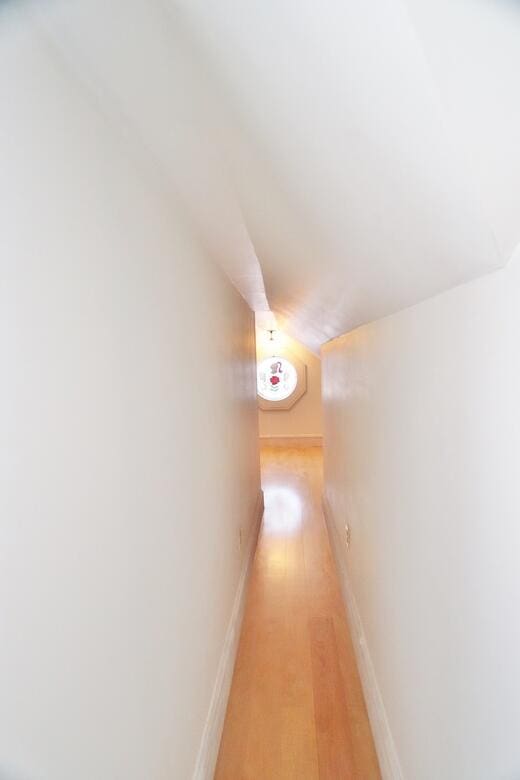 hallway featuring light wood-type flooring