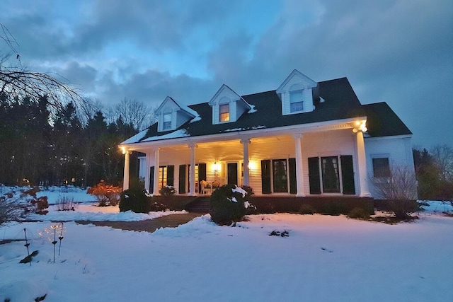 view of front of property featuring covered porch