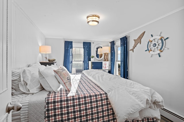 carpeted bedroom with crown molding and a baseboard heating unit